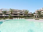New Residences with Spacious Layouts and Pools Near the Coast